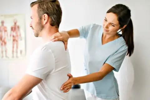 Patient receiving same-day care from a walk-in chiropractor at Suffolk Physical Therapy & Chiropractic in Suffolk County, NY