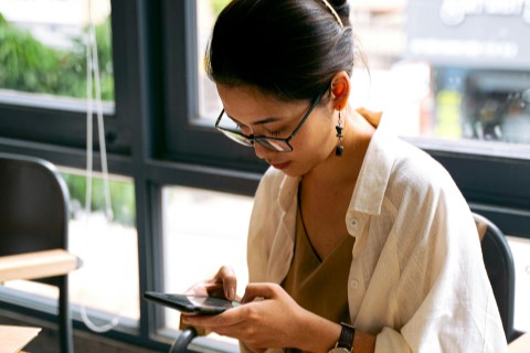 A Picture of a young lady searching for tech neck treatment in Suffolk County, NY