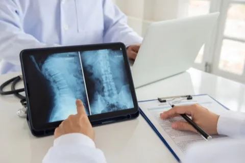 Back Doctor Nearby – Suffolk Physical Therapy & Chiropractic Chiropractor treating patient with back pain at Suffolk Physical Therapy & Chiropractic in Suffolk County, NY
