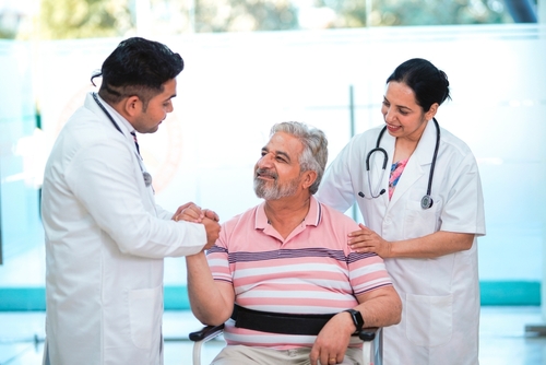 Picture of a person in pain visiting a chiropractic injury clinic