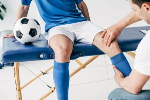 Sports Chiropractor Near Me – Suffolk Physical Therapy & Chiropractic Sports chiropractor performing treatment on athlete at Suffolk Physical Therapy & Chiropractic in Suffolk County, NY