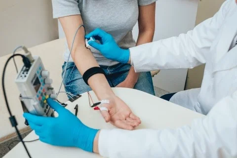 Nerve Test Near Me – Suffolk Physical Therapy & Chiropractic Patient undergoing nerve test near me at Suffolk Physical Therapy & Chiropractic for injury diagnosis