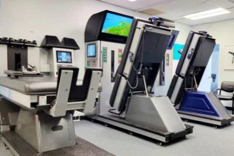 Picture of spinal decompression therapy tables for herniated disc conditions at Suffolk Physical Therapy & Chiropractic