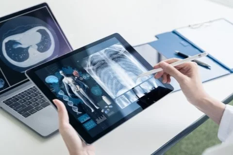 X-Ray Near Me – Suffolk Physical Therapy & Chiropractic Patient receiving digital X-ray near me at Suffolk Physical Therapy & Chiropractic for injury evaluation